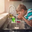 boy-drinking-water