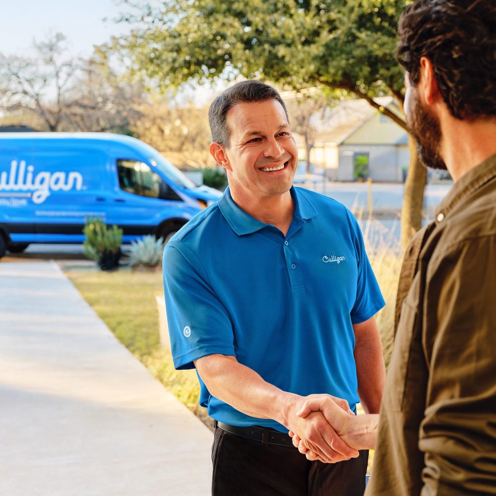 Culligan_Man_Greeting_Dad_Front_Door_Closeup_8_7_2026_5_40_11_PM